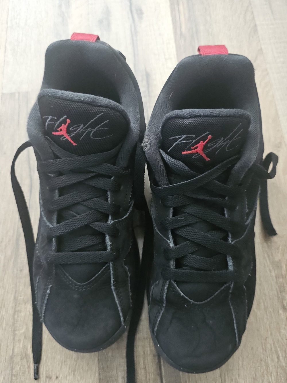 Big Boys Jordan Black Suede Sneakers with Red Jumpman Accents